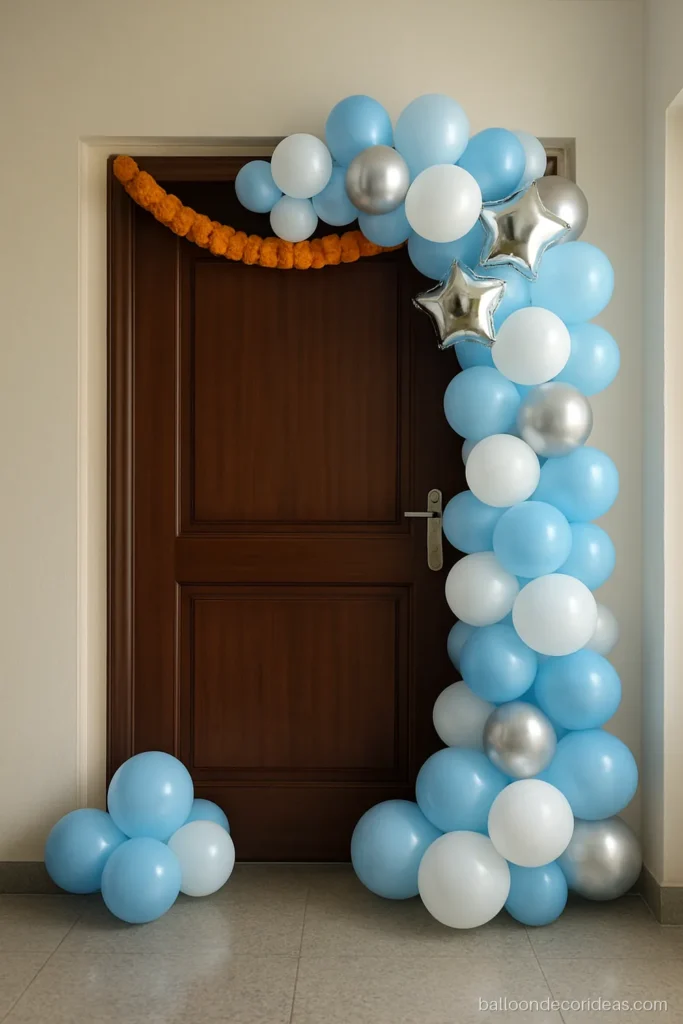 Welcome baby boy balloon decoration with a blue and white arch on the main door