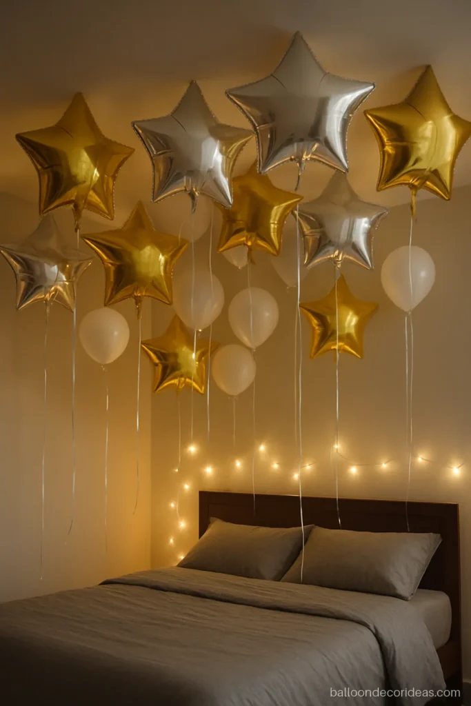 Star foil balloon decoration with plain gold and silver stars floating in a bedroom