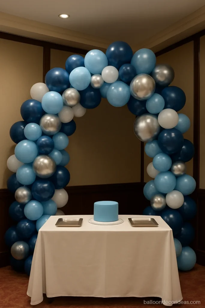 Balloon decoration for 1st birthday boy with navy, sky blue and silver chrome balloons