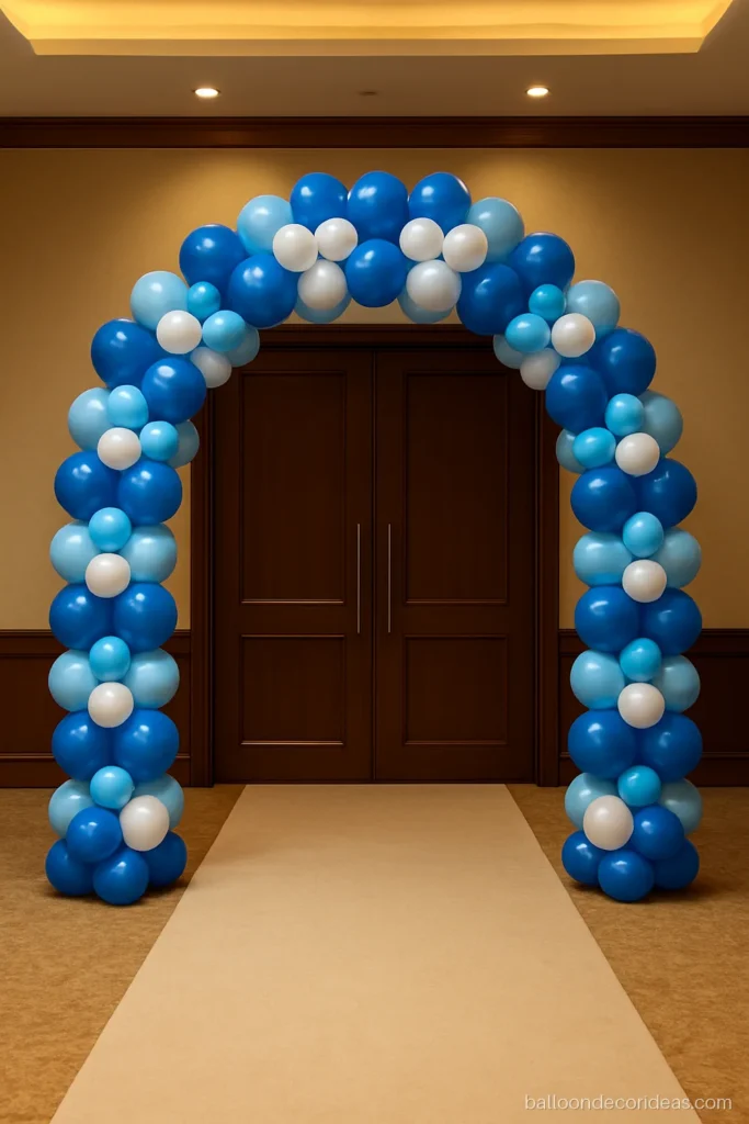 Full nine foot balloon entrance arch in blue and white at a hall door